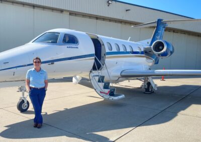 Ashley in front of an Airshare Phenom 300