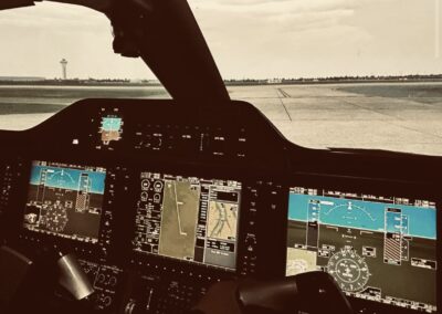 photo out the cockpit of an Airshare Phenom 300 by S. Wynne.