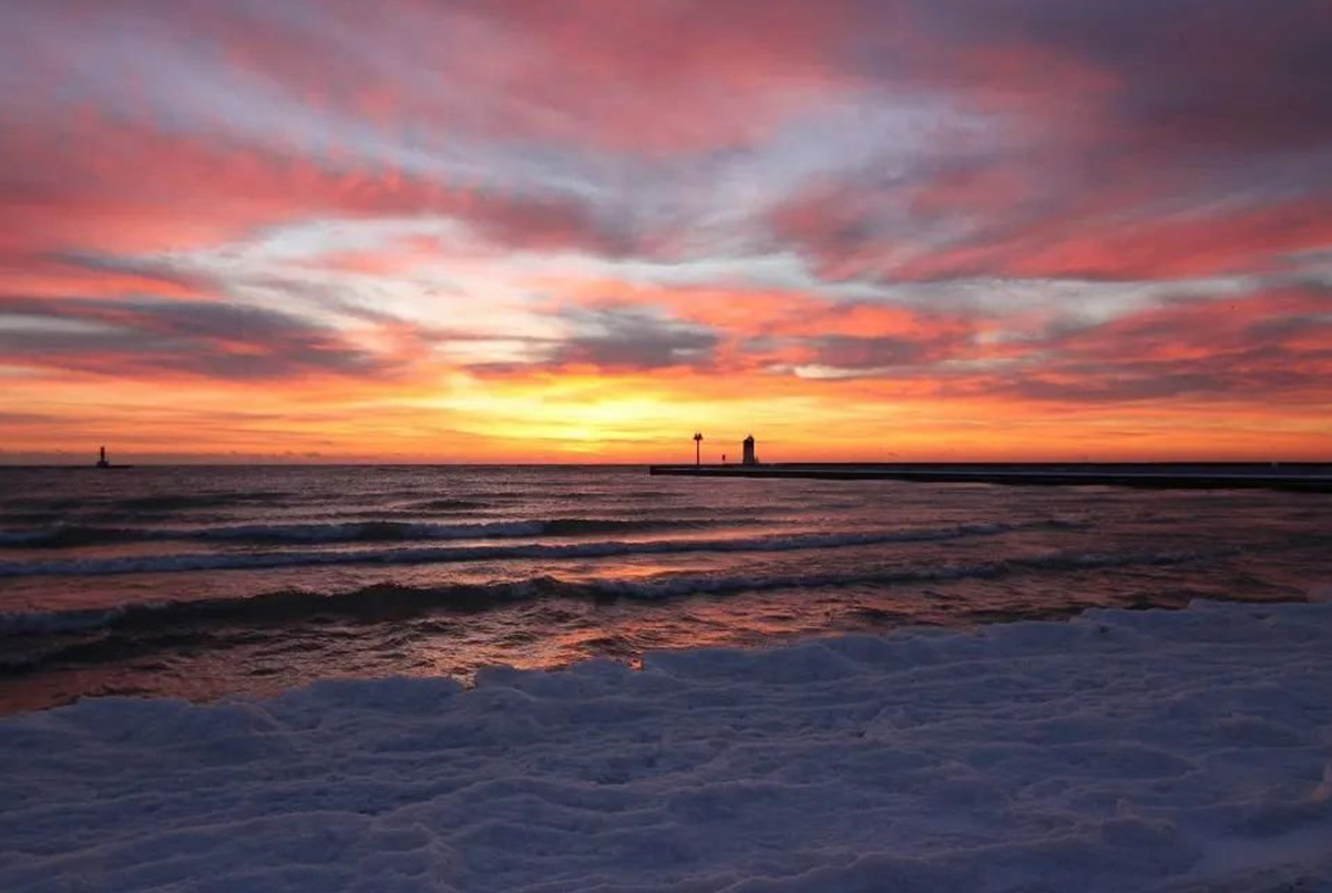 1202x806_Base-WAUKEGAN-Highlights-001 Sunset views looking out on to the water from Waukegan's beach.