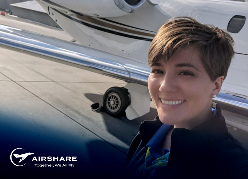 Airshare Employee, Carlisle, standing next to her managed aircraft.