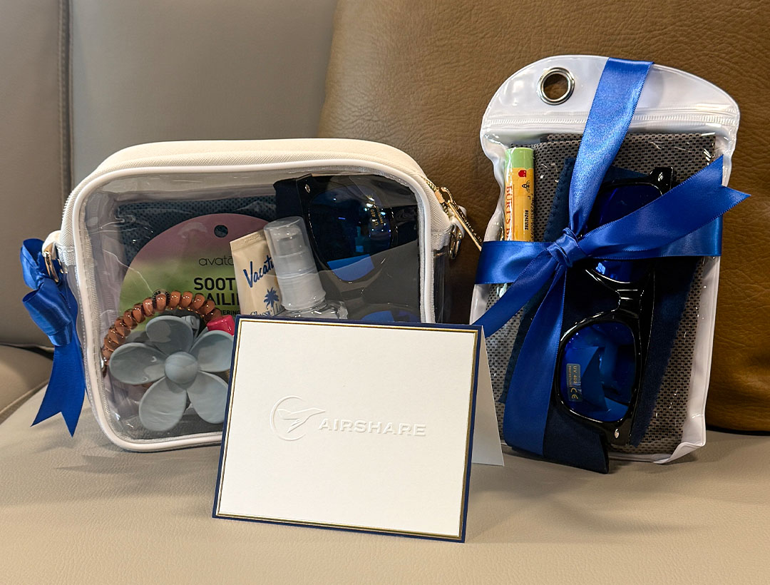 Airshare customer gift "Survival Kits" assembled by employee, Mina Lopez photographed on a chair.