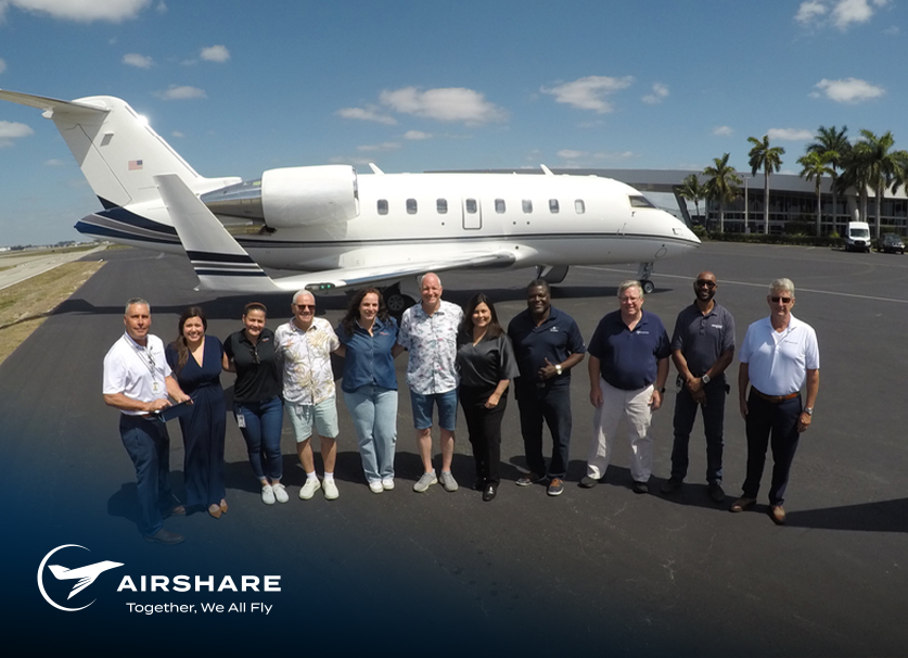 Joseph-Barrett-Retirement-Hero-Img Joseph Barrett pictured along with local co-workers, in front of his Challenger 605 in OPF.