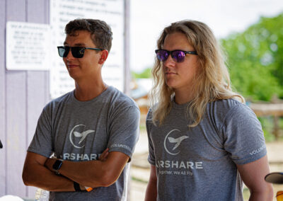 Airshare employees Michael Regan and Brandon Borlinghaus volunteering.