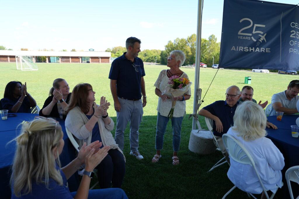 Airshare employee, Terri McKown, being recognized at 25th Anniversary celebration.