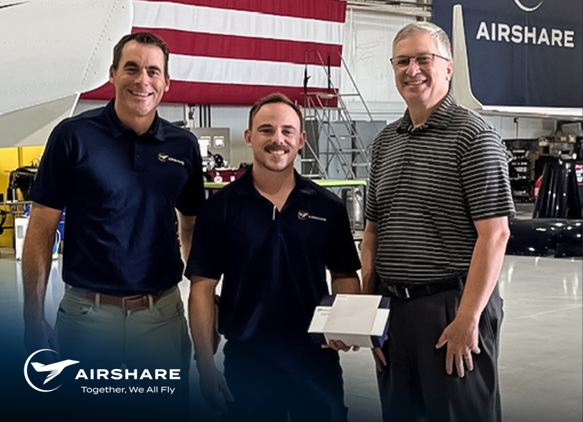 Hero-Img-EoM-Aug-2025-Lyle-Reel Airshare employee, Lyle Reel, being honored as August 2025 Employee of the Month. He is pictured along side Alex Franz and Quinn Harmon.