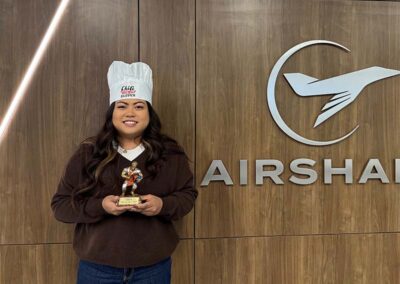 Airshare employee, Jenny Luu, winner of the chili cook off at CHQ.