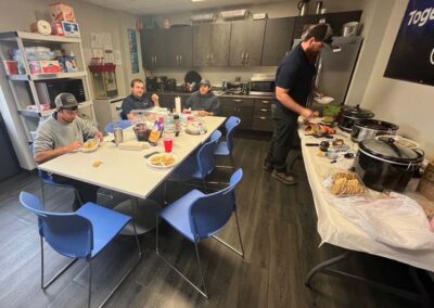 Airshare employees enjoying chili from chili cook off in Wichita.