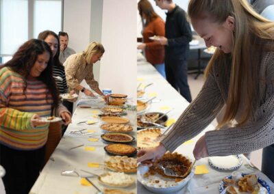 Airshare employees gathered and taste testing pie.