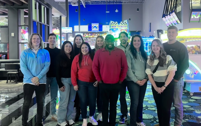 Airshare's Sales, Marketing, and Customer Experience teams pictured together celebrating their holiday outing.